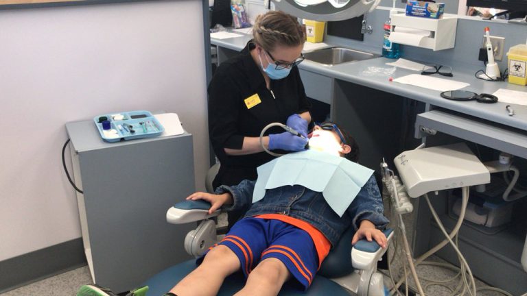CNC dental students polish off school year by giving back