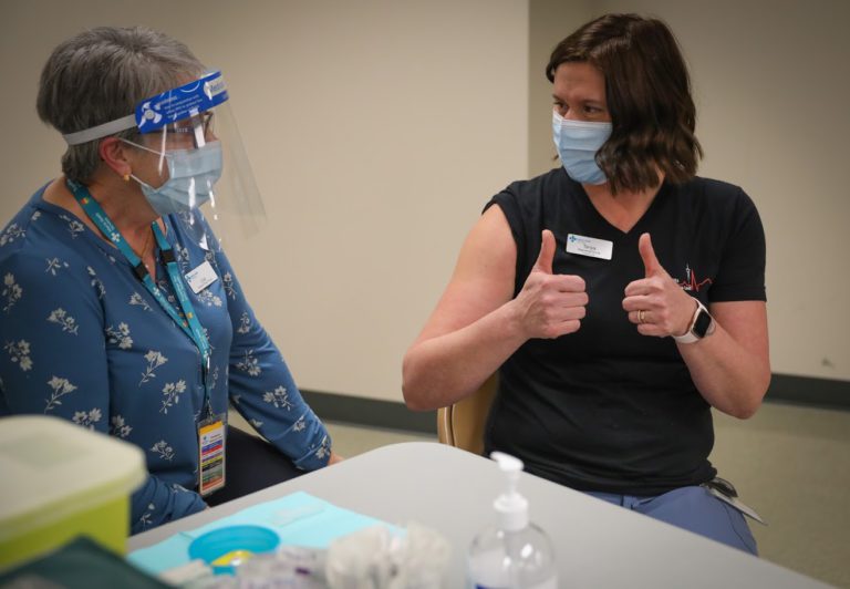 “It felt like hope” ; Registered Nurse describes her experience receiving the Pfizer COVID-19 vaccine