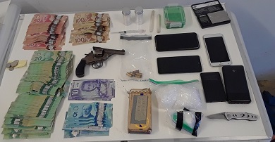 Gun, drugs and cash seized by Smithers BC Highway Patrol