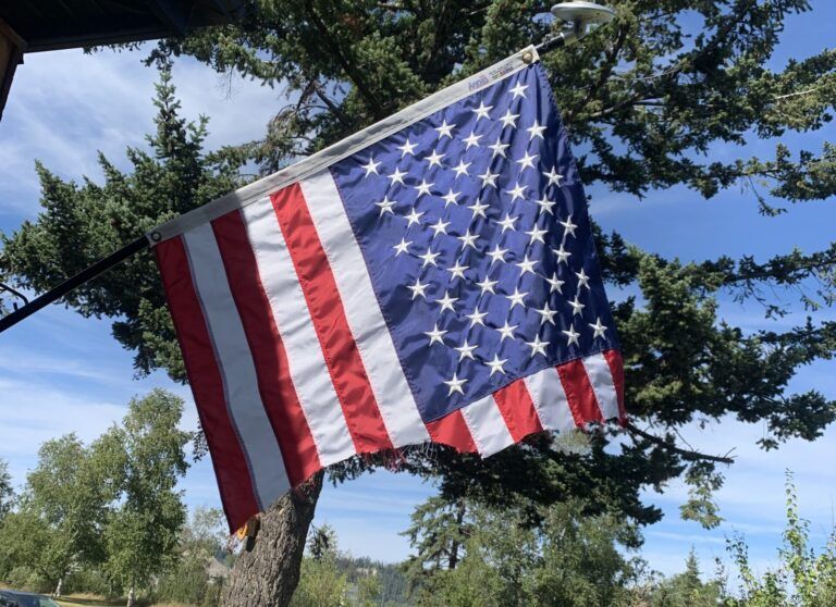 American flag cut down from porch of local Canadian Armed Forces member
